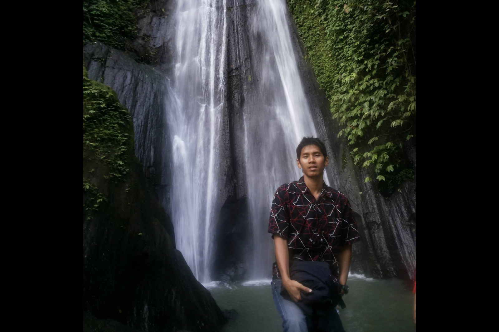 Putra exploring waterfalls in the surrounding region